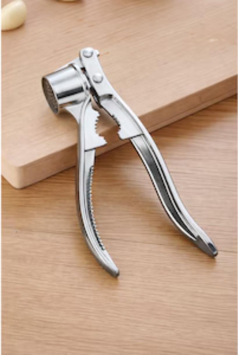 Presa pentru usturoi din inox  15 cm lungime 120 pcs in bax.Comanda minima 12 buc